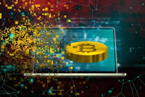 mineração de criptomoedas: uma moeda bitcon sendo minerada.