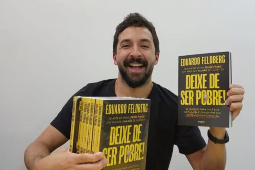 Eduardo Feldberg, o Primo Pobre, com seu livro.