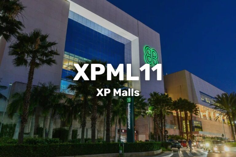 Imagem do fundo imobiliário XPML11 XP Malls, destacando um shopping iluminado à noite, representando investimentos e dividendos.