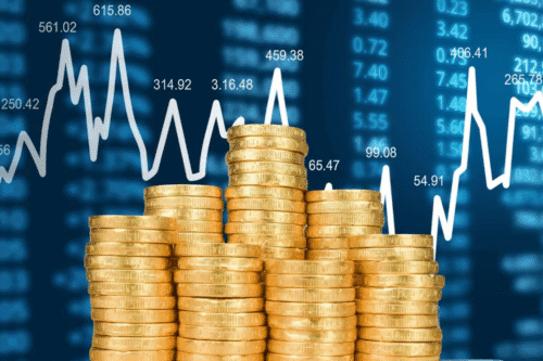 Imagem mostrando gráficos financeiros e pilhas de moedas de ouro, relacionada à análise de BDRs com potencial de alta para investimento em junho, destacando os 5 principais recomendados pelo Itaú BBA.
