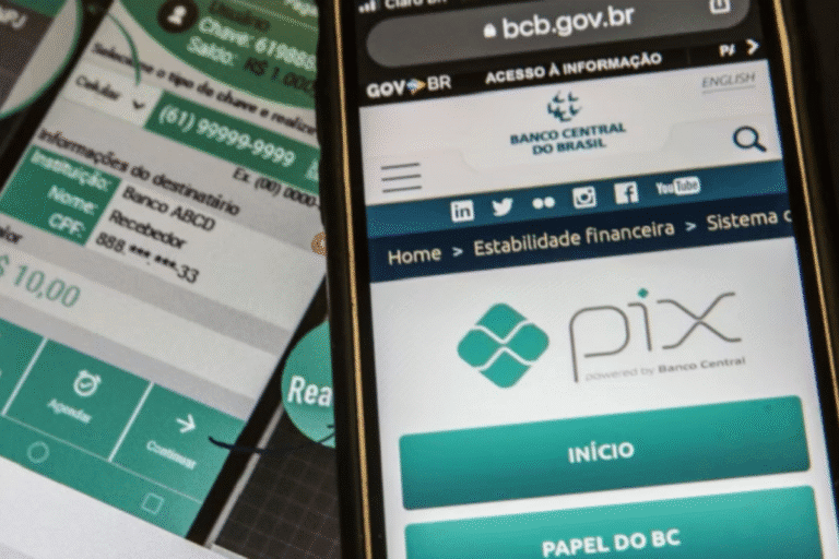 Imagem mostrando o lançamento oficial do PIX automático nesta quarta-feira, com um smartphone acessando o site do Banco Central do Brasil e um QR code de pagamento.