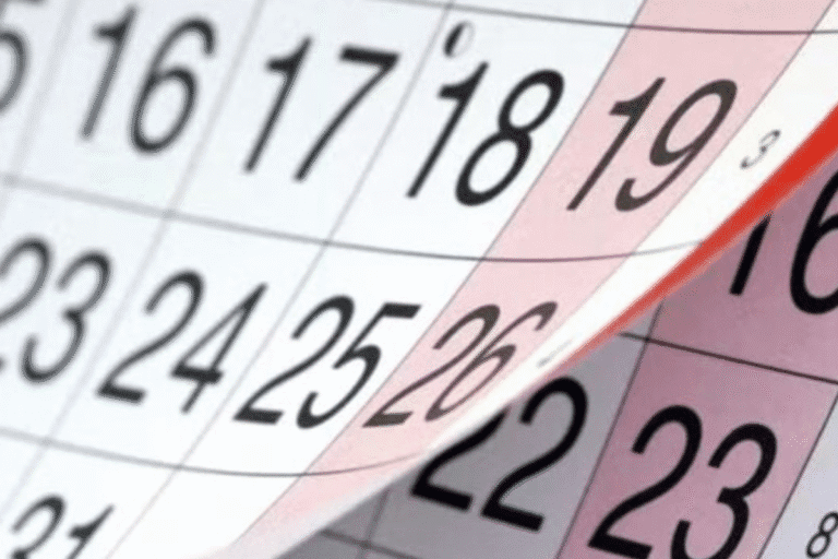 Imagem de calendário em foco, destacando as datas de 16 a 23, mostrando detalhes das datas e a estrutura do calendário em português.