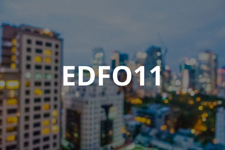 Imagem de uma vista noturna de um bairro na cidade, com prédios altos e luzes acesas, capturada do alto, destacando o clima urbano e sofisticado com a palavra edfo11 destacada