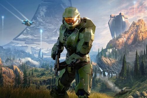 Imagem do personagem Master Chief do jogo Halo, em cenário futurista com ambiente de montanhas, árvores e naves espaciais ao fundo, destacando-se pela armadura verde e cenário de ficção científica.