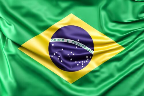 Bandeira do Brasil, símbolo nacional com cores verde, amarelo, azul e branco, destacando a tradição e cultura brasileira
